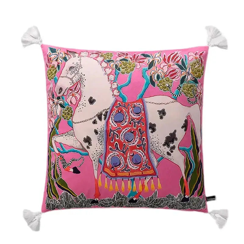 Vibrant pink cushion with white horse and floral motifs featuring a blue lion dog lumbar pillow cover design