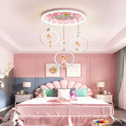 Pink cartoon princess kids room chandelier with led ring and hanging doll figures in white hoops for decorbites cartoon princess decor