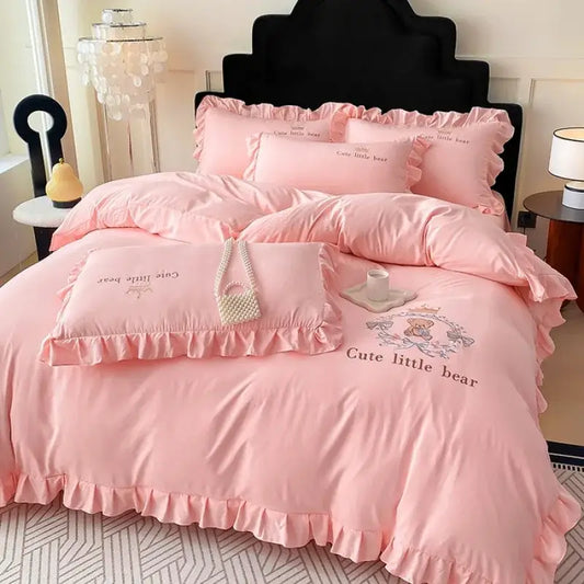 Pink embroidered bear cotton bed skirt set with ruffled satin-like fabric and cute little bear design