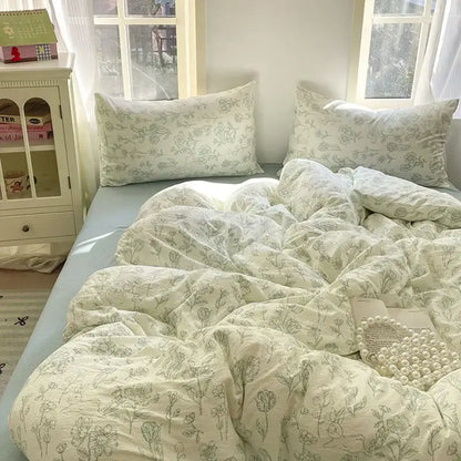 Soft cream-colored double layer yarn bedspread set with delicate green floral embroidery for bedroom bedding