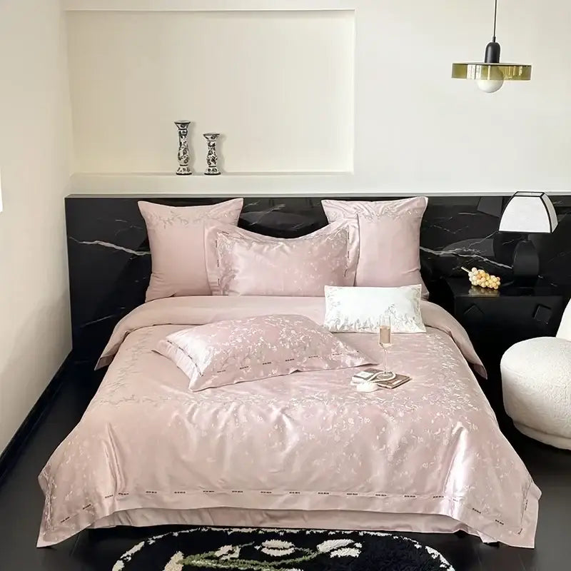 Pink satin egyptian cotton bedding set with subtle floral embroidery featuring decorbites jacquard 100s texture