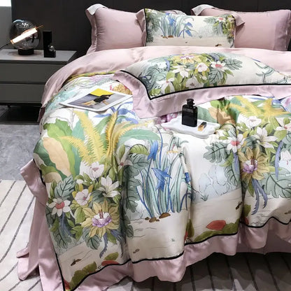 Pink satin duvet set with vibrant eucalyptus lyocell flowers in white yellow and blue on off-white background decorbites