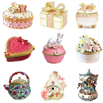 Pink floral heart jewelry trinket box with gold trim and rhinestones as a decorative storage case for jewelry