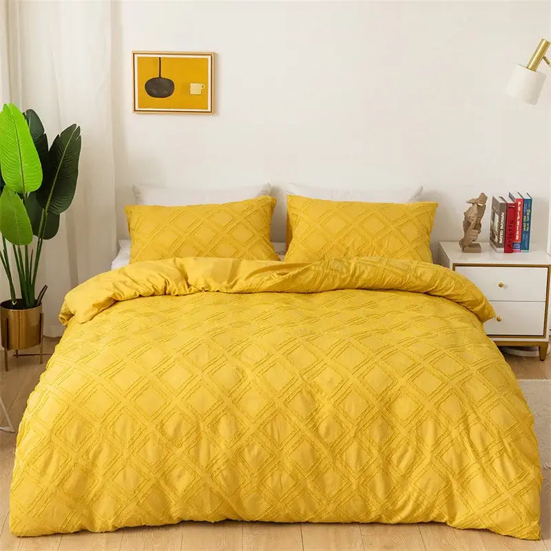 Vibrant yellow quilted duvet bedding set with a diamond pattern featuring decorbites geometric cut flowers design