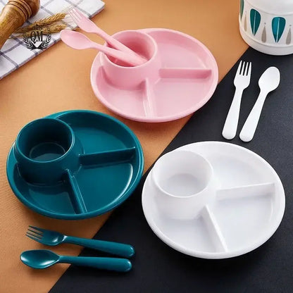 Pink plastic portion control plate with three compartments and integrated cup for kids meal dining room use