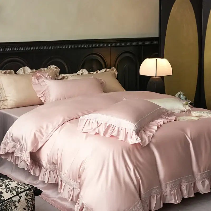 Pink satin bedding set with delicate ruffled edges and lace trim from decorbites 1000tc luxury embroidery collection