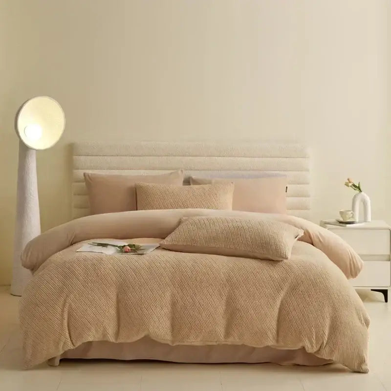 Beige textured duvet set with matching pillows and tufted headboard in winter fleece bedding set for bedroom