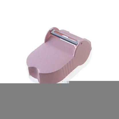 Pink translucent afralia snail peeler with a metallic blade and ergonomic handle for kitchen vegetable peeling