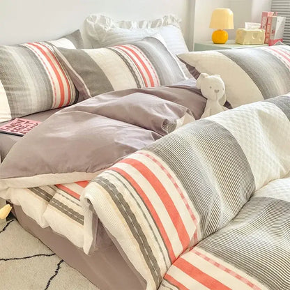 Cozy gray and coral-striped duvet set made of soft decorbites jacquard cotton bedding for elegant bedroom decor