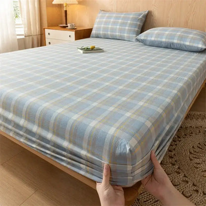 Blue and white plaid decorbites cotton fitted sheet with subtle yellow accents made of soft cotton fabric
