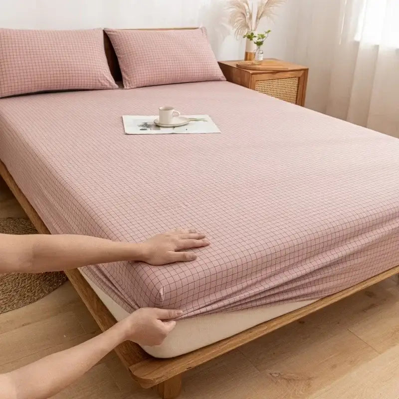 Pink checkered cotton fitted sheet with soft stretchy fabric and subtle grid pattern for comfortable bedding decorbites cotton fitted