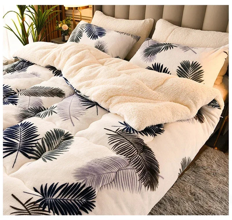 Cream-colored plush duvet set with soft fluffy milk fleece and bold black gray palm leaf patterns for winter warmth