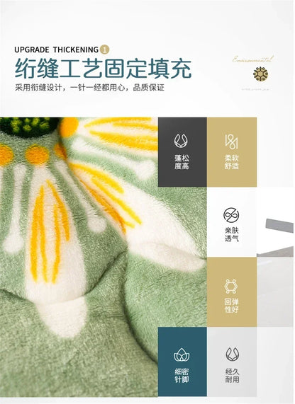 A plush green super thick warm fleece blanket with soft white and yellow embroidered floral pattern for winter use
