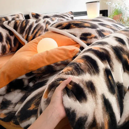 Plush fuzzy leopard-print comforter with black orange and cream spots in decorbites cozy rabbit hair bed set