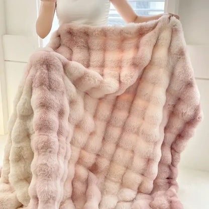 A plush cream and gradient pink double layer faux fur throw blanket with quilted texture for cozy decorbites gradient pink decor