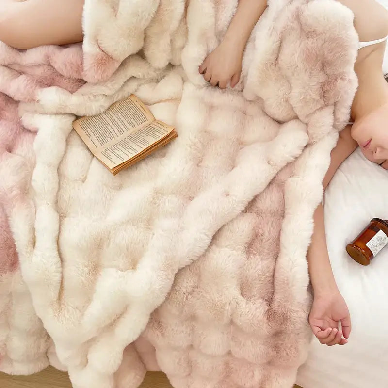 A plush cream and gradient pink double layer faux fur throw blanket with a soft textured surface for decorbites gradient pink
