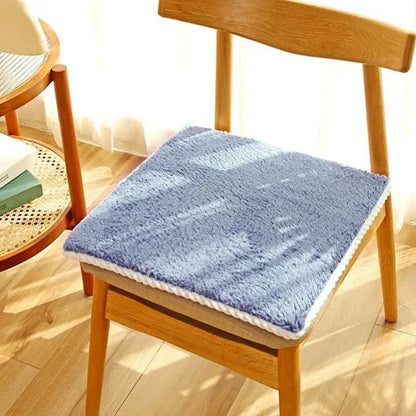 Soft blue wool chair cushion with white braided trim made of lambs wool for decorbites cozy dining room comfort