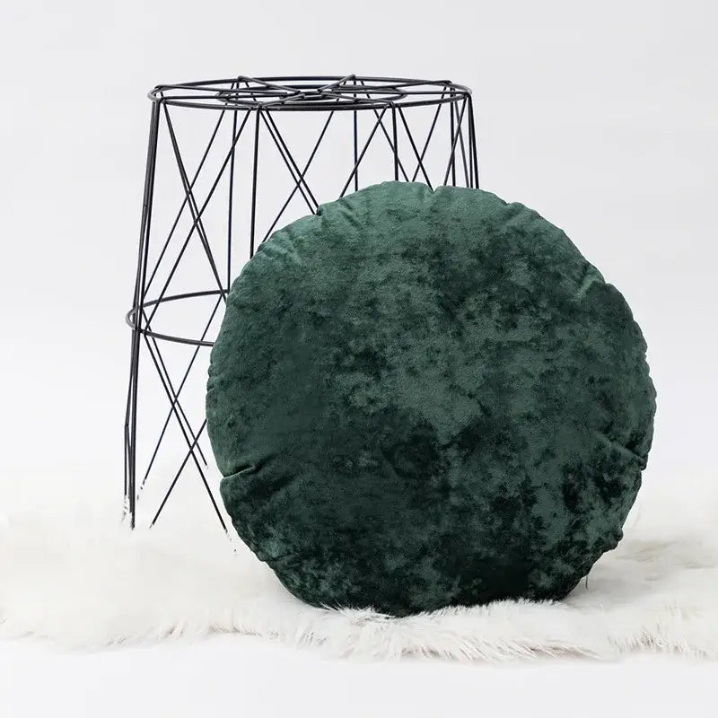 A plush dark grain velvet pillow cover in deep emerald green with a soft textured surface for living room decor