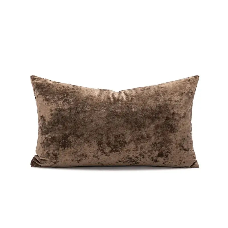 A rectangular taupe velvet pillow cover with a mottled texture perfect for living room decor dark grain velvet pillow cover