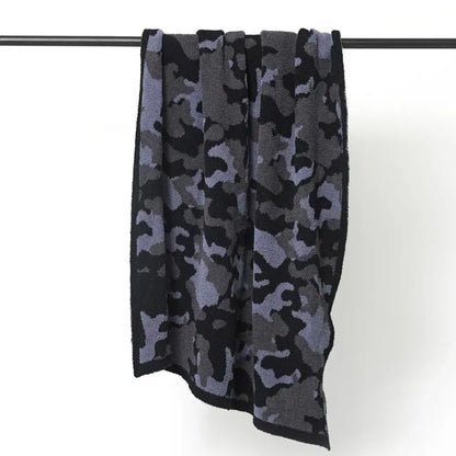 Plush dark gray and black camouflage knitted throw blanket with soft terry cloth texture perfect for bedroom decorbites decor