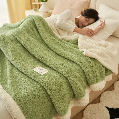 A cozy gray and cream decorbites coral fleece blanket with plush soft texture ideal for sofa or bedroom use
