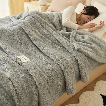 Plush gray and cream coral fleece blanket with soft textured surface for cozy sofa or bedroom decorbites coral fleece