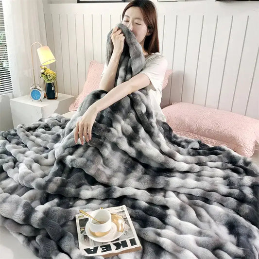 Plush gray gradient fleece throw blanket with chunky textured weave perfect for living room use