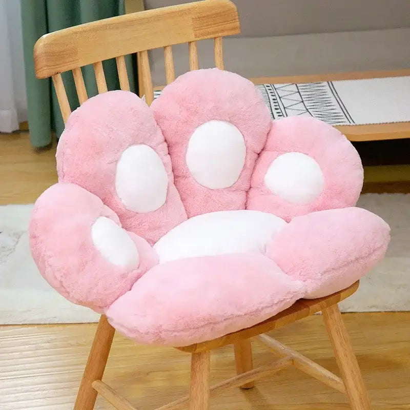 Plush gray and pink cat paw chair cushion with white circular accents for bedroom decor by decorbites cat paw