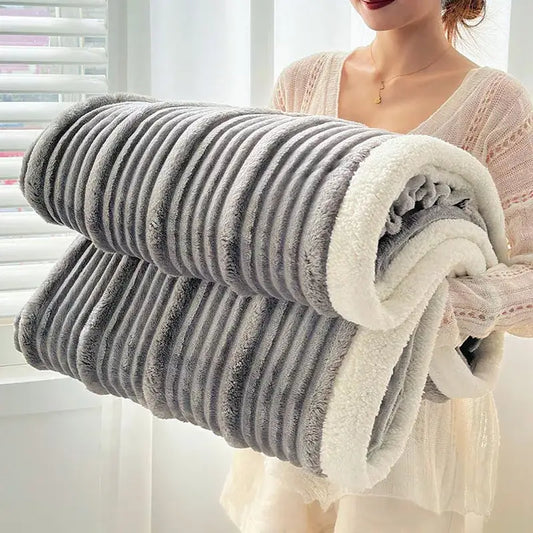 A plush gray and white ribbed sherpa blanket with cozy lamb wool lining for warm decorbites cozy lamb comfort