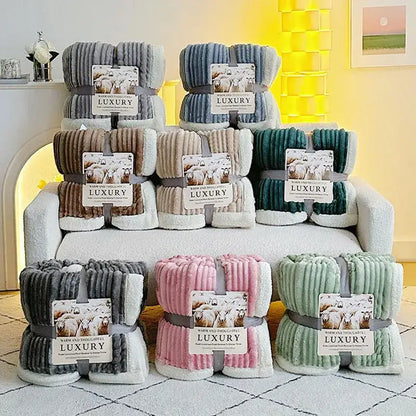 Soft plush blanket in gray with white inner lining and ribbed texture made of cozy lamb wool by decorbites cozy lamb