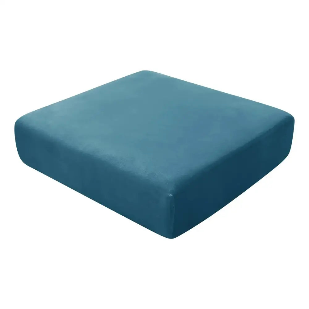 Teal-colored plush cushion with soft fabric texture for living room protector in velvet elastic sofa cover design