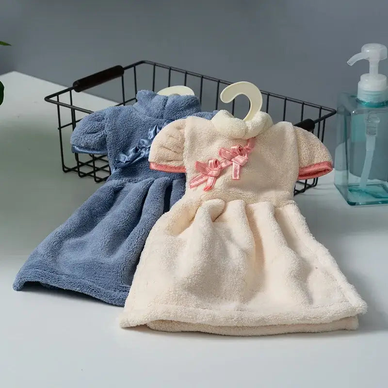 Cream-colored plush coral fleece cheongsam hand towel with pink ribbon accents for kitchen and bathroom decorbites coral fleece