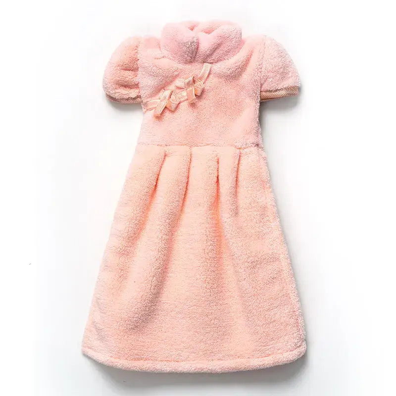 A soft pink plush coral fleece cheongsam hand towel with short puffy sleeves and ruffled collar for kitchen and bathroom decorbites coral fleece