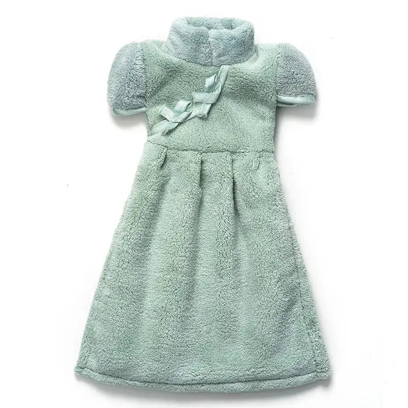 A soft mint green plush dress with high collar and puffed sleeves shown with decorbites coral fleece cheongsam hand towel
