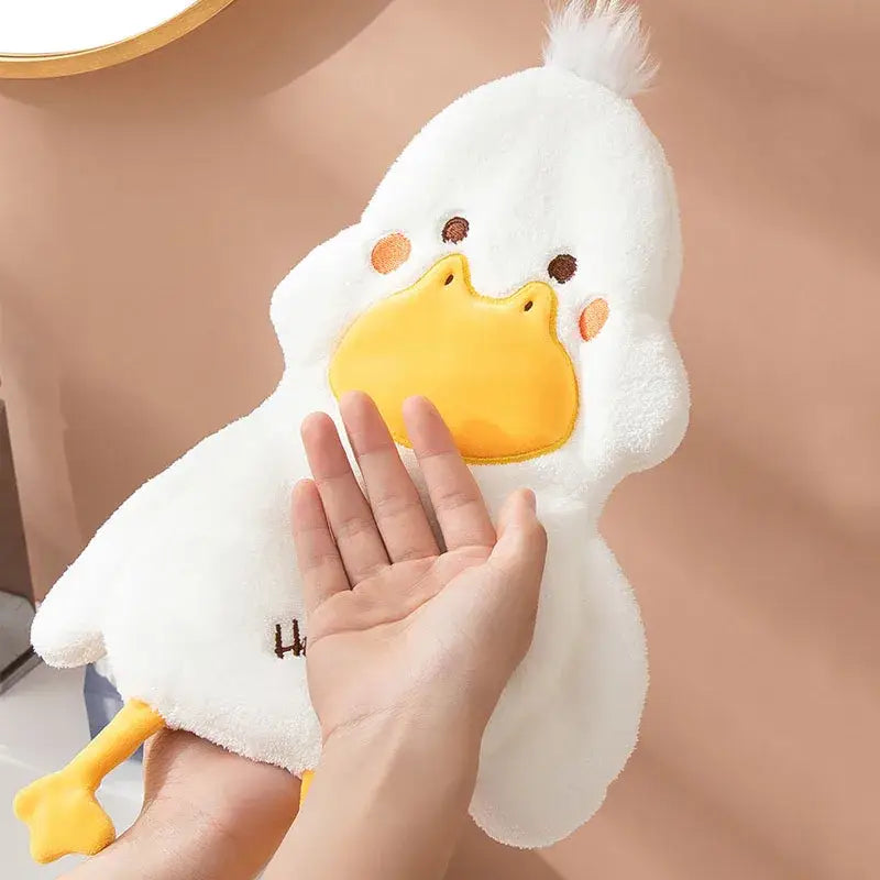 Plush white and gray duck terry towel with bright yellow beak and feet for kitchen cleaning use
