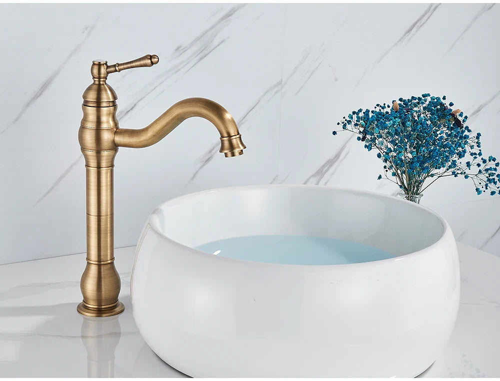 Poiqihy antique brass single hole deck mounted basin vessel sink faucet with curved spout and decorative ridged base