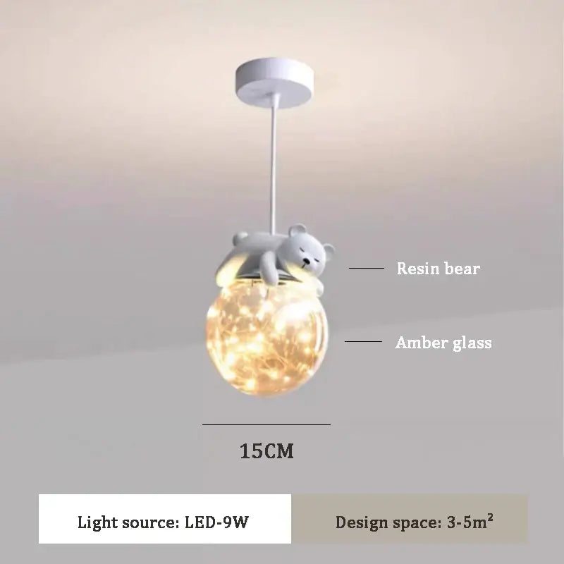 Cute gray resin polar bear perched on amber glass animal led chandelier with internal fairy lights for children’s room
