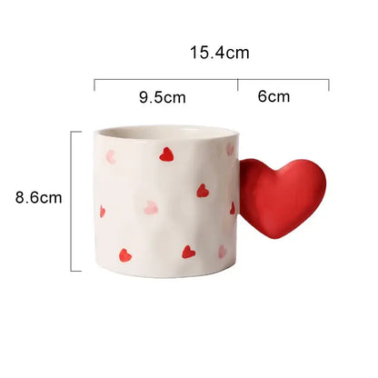 White ceramic heart design ceramic mug with glossy finish and 3d red heart handle from decorbites heart design set