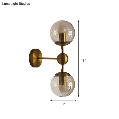 Post modern brass and amber glass wall light with two spherical glass globes for bedroom e26 e27 sconce