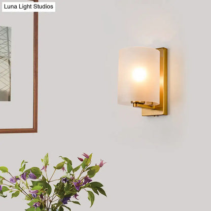 Post modern brass wall sconce with frosted glass shade featuring clear textured white light for bedroom use 110v-120v 220v-240v