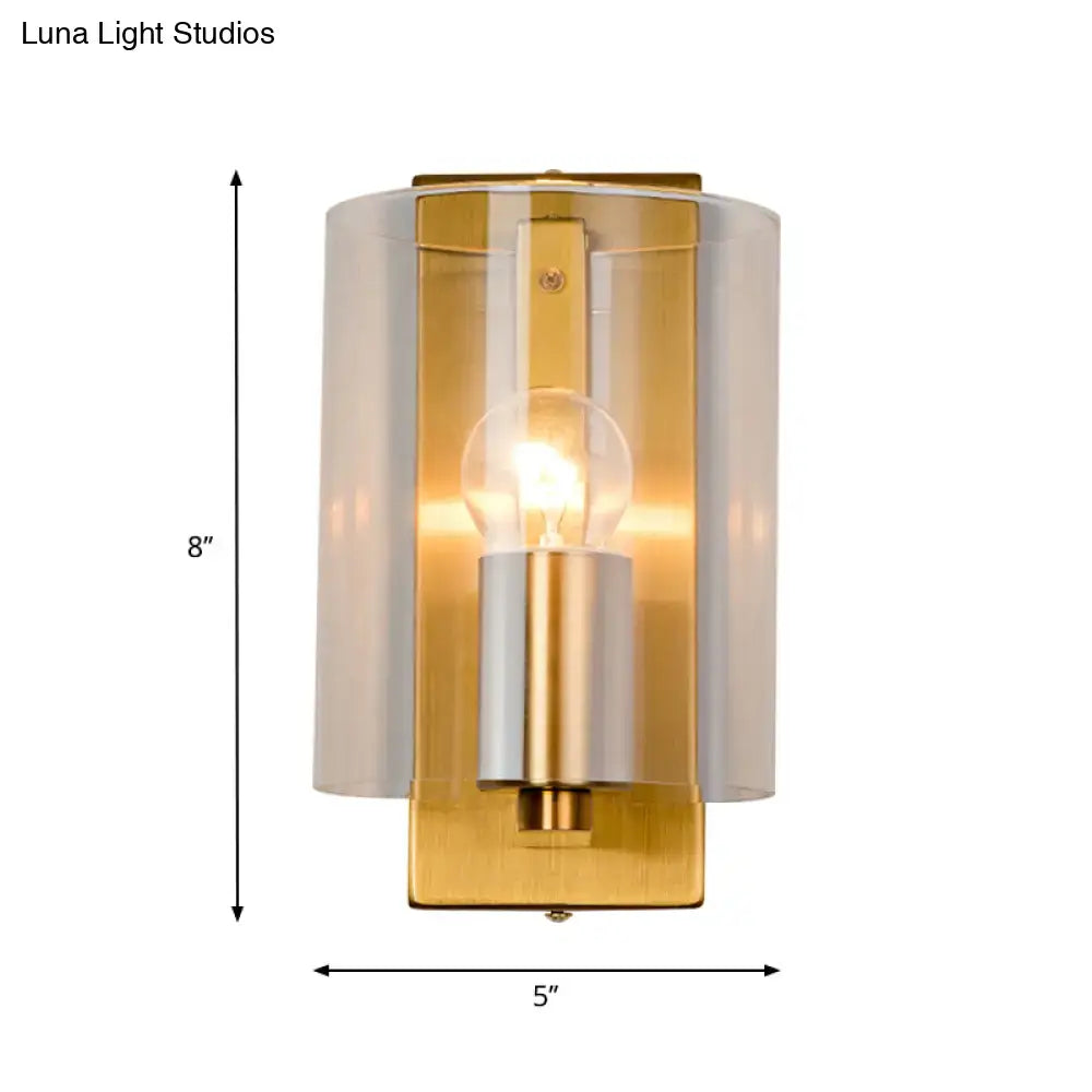 Post modern brass wall sconce with gold tone, frosted glass cylinder, exposed bulb, clear textured white light, 110v-120v 220v-240v