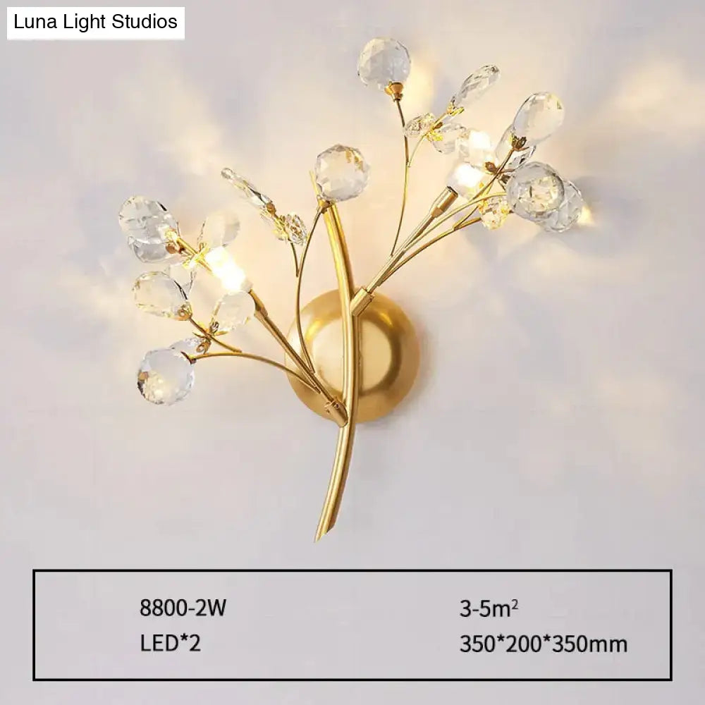 Post modern luxury gold crystal branch wall sconce with delicate faceted crystal droplets for bedroom lighting