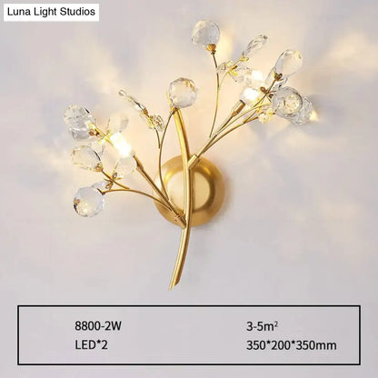 Post modern luxury gold crystal branch wall sconce with delicate faceted droplets for bedroom lighting