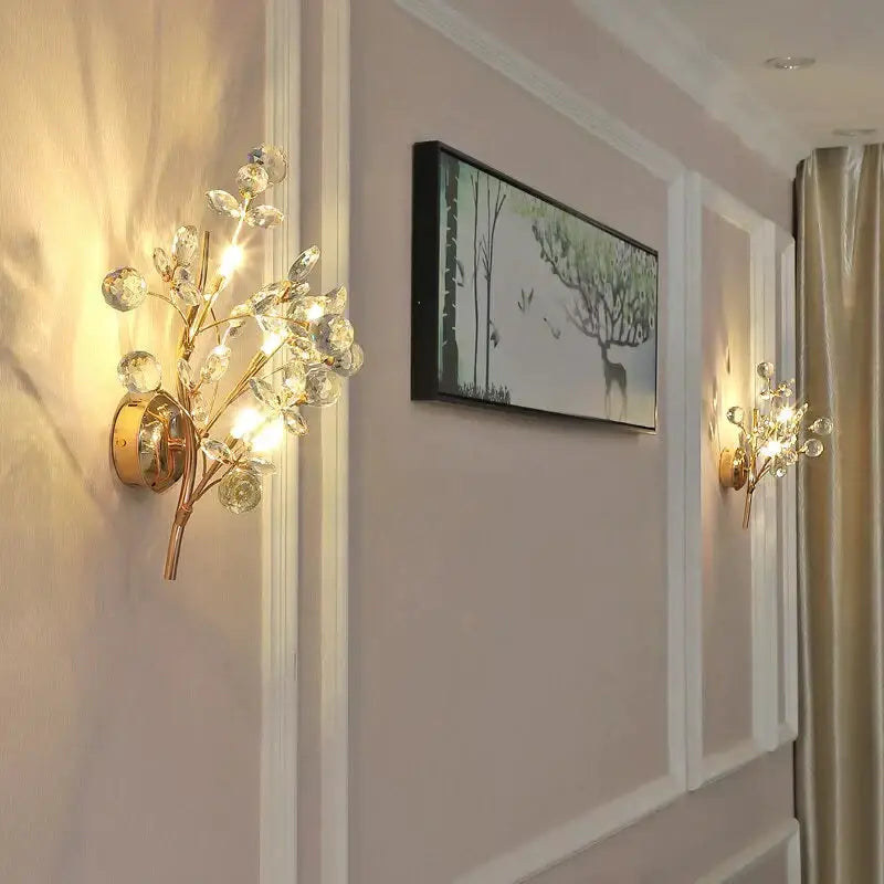 Post modern luxury gold crystal branch wall sconce with clear faceted crystals for elegant bedroom lighting