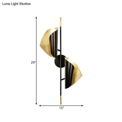 Postmodern black and gold ribbed leaf wall light with two curved metallic shades for staircase lighting