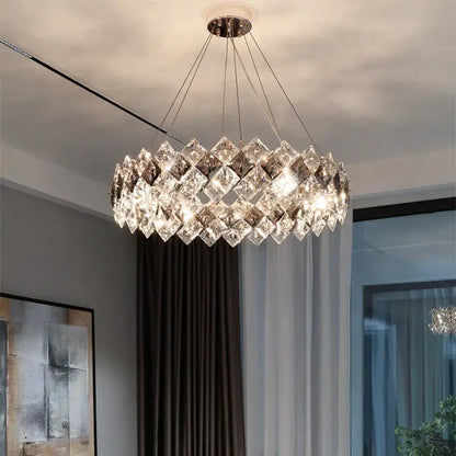 A modern postmodern clear and smoky decorbites crystal chandelier with faceted glass and chrome mount for living room