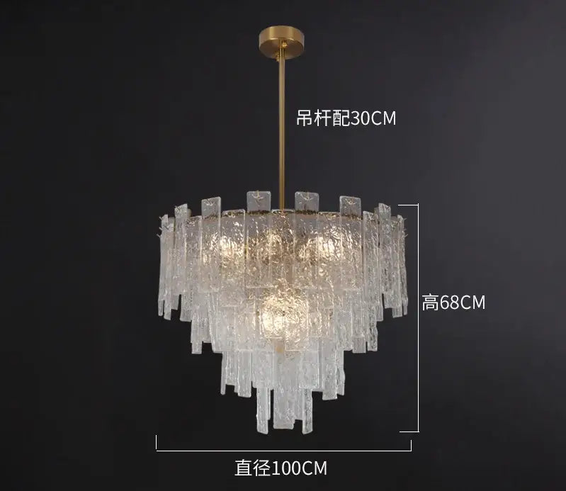 A postmodern decorbites crystal chandelier with brass rod and cascading frosted glass tiers for dining room lighting