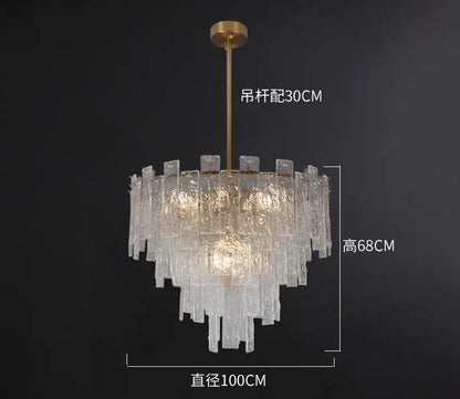 A postmodern decorbites crystal chandelier with brass rod and cascading frosted glass tiers for dining room lighting