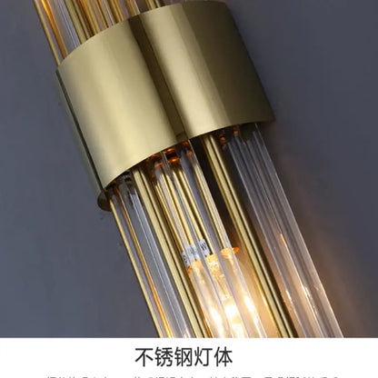 Postmodern gold and crystal copper wall lights featuring a cylindrical stainless steel base with clear glass tubes for bedroom decorbites crystal copper wall lighting
