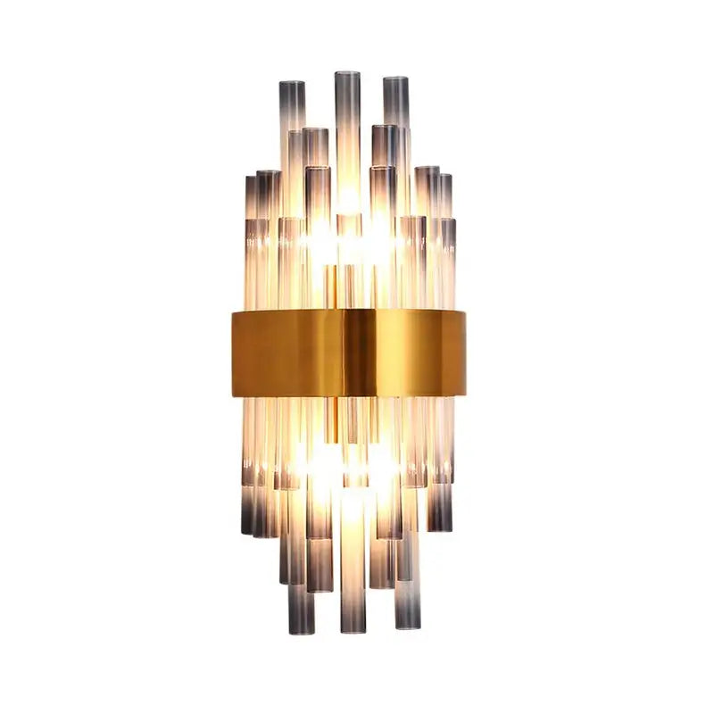 Postmodern gold and gray cylinder wall lamp with a gold-toned metal band and translucent amber glass tubes for hallway lighting